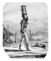 Brown slave in Rio de Janeiro, vintage engraving. photo