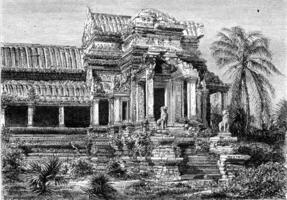 Ruins at Angkor Wat, exterior facade of a house, vintage engraving. photo