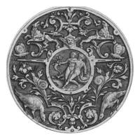 Round ornament, in a medallion in the middle is a pair photo
