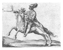 Horseman firing a shot with a pistol photo
