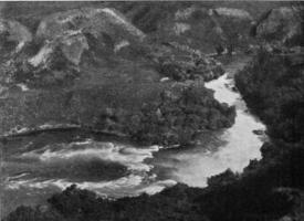 Rapids of a mountain stream, vintage engraving. photo