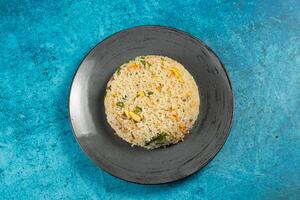 Egg Fried Rice served in a dish isolated on background side view of chinese food photo