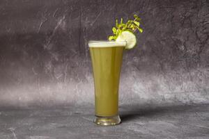 Fresh Lemon Mint with lime slice served in glass isolated on background top view of bangladesh drink photo