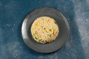 Egg Fried Rice served in a dish isolated on background side view of chinese food photo