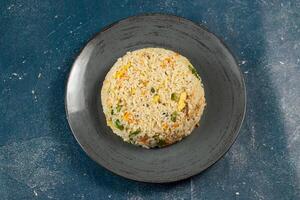 Egg Fried Rice served in a dish isolated on background side view of chinese food photo