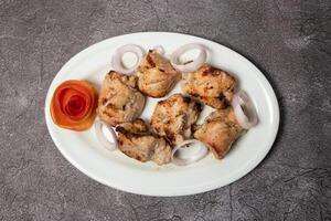 Chicken Reshmi tikka Kabab or malai boti seekh with onion served in dish isolated on background top view of bangladesh food photo