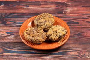 Indian food Jali kabab with tomato sauce served in a dish isolated on background top view photo