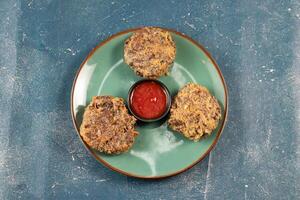 Indian food Jali kabab with tomato sauce served in a dish isolated on background top view photo