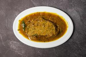 Chitol fish Kofta Curry chital korma served in dish isolated on background top view of bangladesh food photo