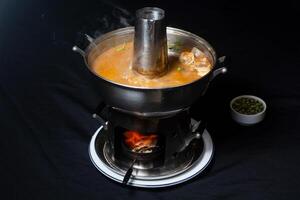 Thai Hot Pot served in dish isolated on grey background top view of indian and bangladesh food photo