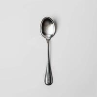 AI generated minimalistic style silver spoon on white background top view photo