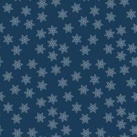 A seamless pattern of snowflakes falling on a dark blue background. Winter pattern. A chaotic fall. Snowflake outline icon. Vector illustration