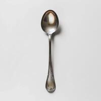 AI generated minimalistic style silver spoon on white background top view photo