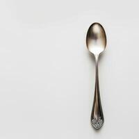 AI generated minimalistic style silver spoon on white background top view photo