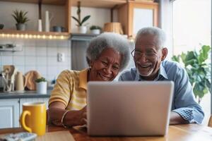 AI generated Happy senior couple having a video call on a laptop at home photo