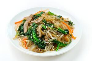 ai generado japchae servido en un plato aislado en blanco antecedentes foto