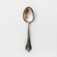 AI generated minimalistic style silver spoon on white background top view photo