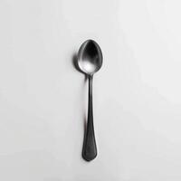 AI generated minimalistic style silver spoon on white background top view photo