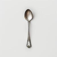 AI generated minimalistic style silver spoon on white background top view photo