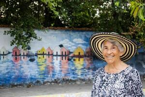 Senior woman tourist at the Macondo Linear Park in Aracataca the birthplace of the Colombian Literature Nobel Prize Gabriel Garcia Marquez photo