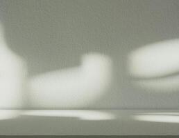 Empty Studio Kitchen room with Sunlight reflect on table top,Green Concrete texture wall background with light,leavs shadow,Backdrop for Spring,Summer product design presentation photo