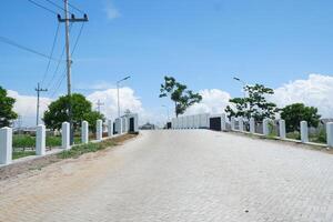 Empty road in the park with blue sky and white cloud background. photo