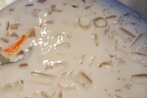 ice cendol in a pot with a spoon close-up photo