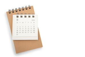 Simple desk calendar for SEPTEMBER 2024 and blank memo isolated on white background. Calendar concept with copy space. photo