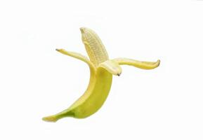 isolated peeled Cavendish bananas on white background It is a fruit with good taste. The aroma is delicious. The peel is thin, not sticky. The skin color of bananas turns golden yellow when ripe. photo