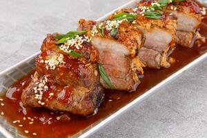 roasted appetizing pork on a stone background studio food photo 11