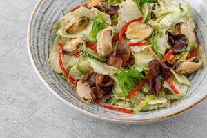 salad with mussels and tree mushroom studio food photo 3