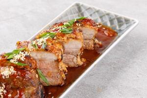 roasted appetizing pork on a stone background studio food photo 7