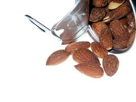 Almonds Salted on white background photo