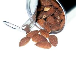 Almonds Salted on white background photo