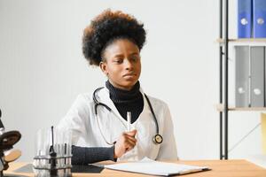 Medical doctor woman working at laboratory - copyspace. photo