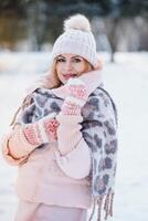 Beautiful smiling woman winter portrait photo