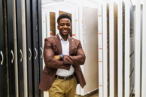 Portrait of salesperson in bathroom store. Happy man works in bath store. Sales occupation. photo