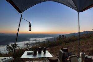 dipping coffee set on mountain background photo