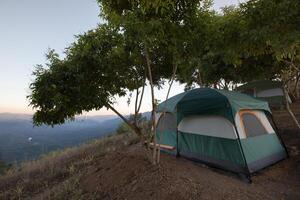 Camping tent  under clear sky photo