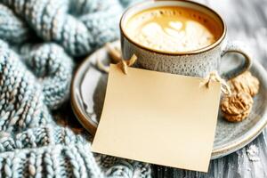 Cozy Winter Concept with Blank Note and Knitwear. photo