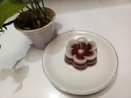 Photo of flower-shaped chocolate layer cake