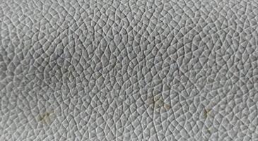 White leather texture background. Close up of white leather texture background. photo