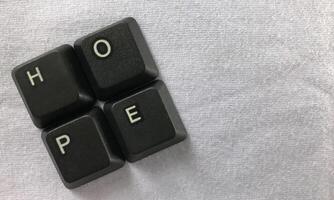 teclado llaves con el palabra ayuda en un blanco antecedentes cerca arriba foto