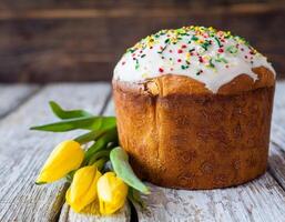 Easter egg panettone bread cake background Happy easter spring holiday tulip photo