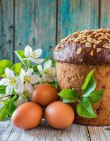 Easter egg panettone bread cake background Happy easter spring holiday tulip photo