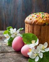 Easter egg panettone bread cake background Happy easter spring holiday tulip photo