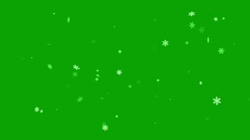 Snowfall overlay on green background. Winter slowly falling snow effect. 4K animation. video