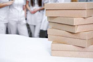 Catering Boxes Ready for Office Celebration with Medical Staff photo