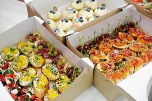 Assorted canapes and bruschetta from catering photo