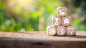 Success concept, Wooden block on desk with success icon on virtual screen. photo